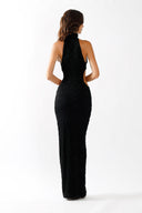Back view of the Room 24 Camilla black cut-out dress showing its halterneck construction, textured fabric and body-contouring fit.