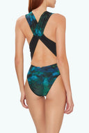 Back view of the Room 24 Rachel swimsuit showing its wide crossover straps, low open back and high-cut silhouette.