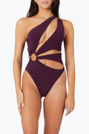 Front view of the Room 24 Cara one-piece swimsuit with an asymmetric neckline, sculptural cut-outs and statement ring detail.
