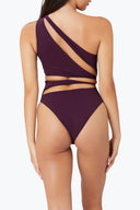 Back view of the Room 24 Cara swimsuit showing its asymmetric construction and sculpted close-fitting silhouette.