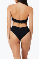Back view of the Room 24 Adriana swimsuit showing its open-back design, chain detail and high-waisted silhouette.