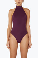 Front view of the Room 24 Lea one-piece swimsuit with a high halterneck, sculpted fit and high-cut legs.