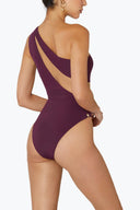Side view of the Room 24 Freya bordeaux one-piece highlighting its curved illusion-mesh panels and high-cut leg.