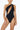 Front view of the Room 24 Louise one-piece swimsuit with an asymmetric neckline, sweeping cut-out and chain detailing.
