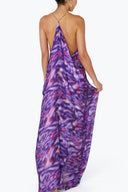 Back view of the Room 24 Raja purple maxi dress highlighting its gold-tone chain straps and dramatic draped open back.