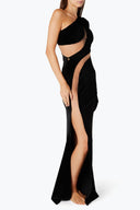 Side view of the Room 24 Verper black maxi dress highlighting its curved mesh cut-outs, velvet finish and high leg split.