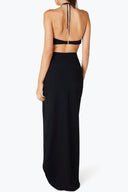 Back view of the Room 24 Sumie skirt showing its high-rise waist and close-fitting maxi silhouette.
