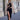 Front view of the Room 24 Joanna black maxi dress with a one-shoulder neckline, sweeping cut-outs and thigh-high split.