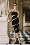 Front view of the Room 24 Sienna black strapless midi dress with diagonal illusion-mesh panels and a sculpted bodycon fit.