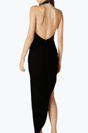Back view of the Room 24 Anita black maxi dress highlighting its dramatic low open back and high side split.