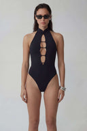 Front view of the Room 24 Lara black halterneck bodysuit with a high collar and vertical ladder-style chest cut-outs.