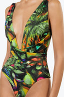 Side view of the Room 24 Amelia one-piece highlighting its crossover waist, sculpted fit and high-cut leg.