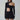 Woman wearing a black cut-out mini dress with long sleeves and asymmetrical neckline