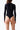 Back view of woman wearing black long sleeve sustainable bodysuit with high-cut leg