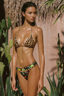 Side view of the Room 24 Vira bikini bottom highlighting its low-rise fit and layered waistband.