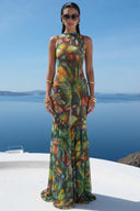 Front view of the Room 24 Ariel tropical print mesh maxi dress with a high neckline, fitted silhouette and flared mermaid hem.