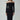Woman wearing off-shoulder black long sleeve maxi dress with sunglasses and silver bangles