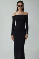 Front view of the Room 24 Celeste black maxi dress with a folded off-shoulder neckline, long sleeves and fitted silhouette.
