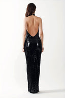 Back view of the Room 24 Larissa black sequin maxi dress highlighting its dramatic low open back and halterneck fastening.