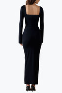 Back view of the Room 24 Bella black maxi dress showing its reversible square neckline and dramatic open-back styling option
