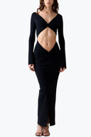 Front view of the Room 24 Bella black reversible maxi dress styled with a twisted V-neckline, curved waist cut-out and long sleeves.