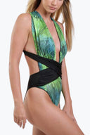 Side view of the Room 24 Rachel swimsuit highlighting its draped crossover waist, sculpted fit and high-cut leg.