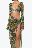 Side view of the Room 24 Sumie maxi skirt showing its draped gathering, knotted detail and high split.