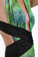 Side view of the Room 24 Rachel swimsuit highlighting its draped crossover waist, sculpted fit and high-cut leg.
