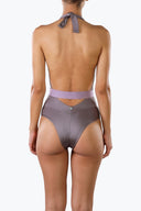 Back view of the Room 24 Zelda swimsuit showing its adjustable halterneck tie, open back and curved waist cut-out.