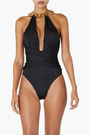 Front view of the Room 24 Zina one-piece swimsuit with a plunging halterneck, gathered cups and crossover waist panels.