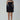 Front view of the Room 24 Sola black mini dress with a sheer illusion neckline, long glove sleeves and flared A-line skirt.