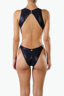 Back view of the Room 24 Fanny one-piece swimsuit showing its wide shoulder straps, open-back design and sculpted fit.