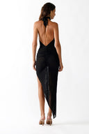 Back view of the Room 24 Jovi black mesh dress highlighting its low open back, tie-neck fastening and ruched centre seam