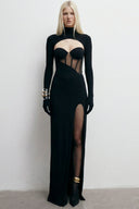 Front view of the Room 24 Talia black corset maxi dress with a mesh-panelled bodice, integrated gloves and thigh-high split.