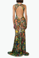 Back view of the Room 24 Ariel tropical print maxi dress highlighting its dramatic open back and full-length flared hem.