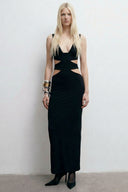 Front view of the Room 24 Kaya black maxi dress with a deep V neckline, geometric waist cut-outs and fitted silhouette.