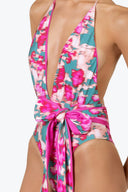 Side view of the Room 24 Chloe Flora one-piece showing its gathered waist, plunging neckline and sculpted fit.