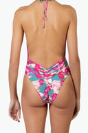 Back view of the Room 24 Chloe Flora swimsuit highlighting its wide crossover straps and open-back design.
