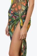 Side view of the Room 24 Sumie maxi skirt showing its draped gathering, knotted detail and high split.