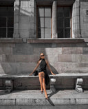Front view of the Room 24 Lea one-piece swimsuit with a high halterneck, sculpted fit and high-cut legs.