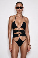 Front view of the Room 24 Alexa black one-piece swimsuit with a plunging halterneck, ruched panels and crossover cut-out straps.