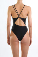 Back view of the Room 24 Alina black swimsuit showing its delicate straps, sculpted fit and medium-coverage back.