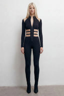 Front view of the Room 24 Anna black catsuit with a high collar, centre zip, shoulder cut-outs and strappy waist.