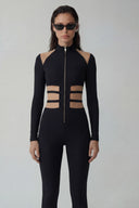 Front view of the Room 24 Anna black catsuit with a high collar, centre zip, shoulder cut-outs and strappy waist.