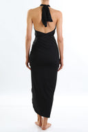 Back view of the Room 24 Astrid black evening dress highlighting its halterneck construction, low open back and fitted silhouette.