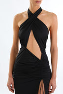 Front view of the Room 24 Astrid black cut-out dress with a crossover halterneck, ruched skirt and thigh-high split.