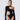 Front view of the Room 24 Bridget black asymmetric bodysuit with a high neckline, curved waist cut-out and glove sleeves.