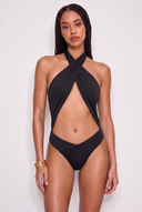 Front view of the Room 24 Carol one-piece swimsuit with a crossover halterneck, wrapped panels and statement torso cut-out.