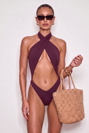 Front view of the Room 24 Carol one-piece swimsuit with a crossover halterneck, wrapped panels and statement torso cut-out.