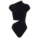 Close-up of the Room 24 Clara black bodysuit showing the draped crossover fabric and diagonal cut-out detailing.
